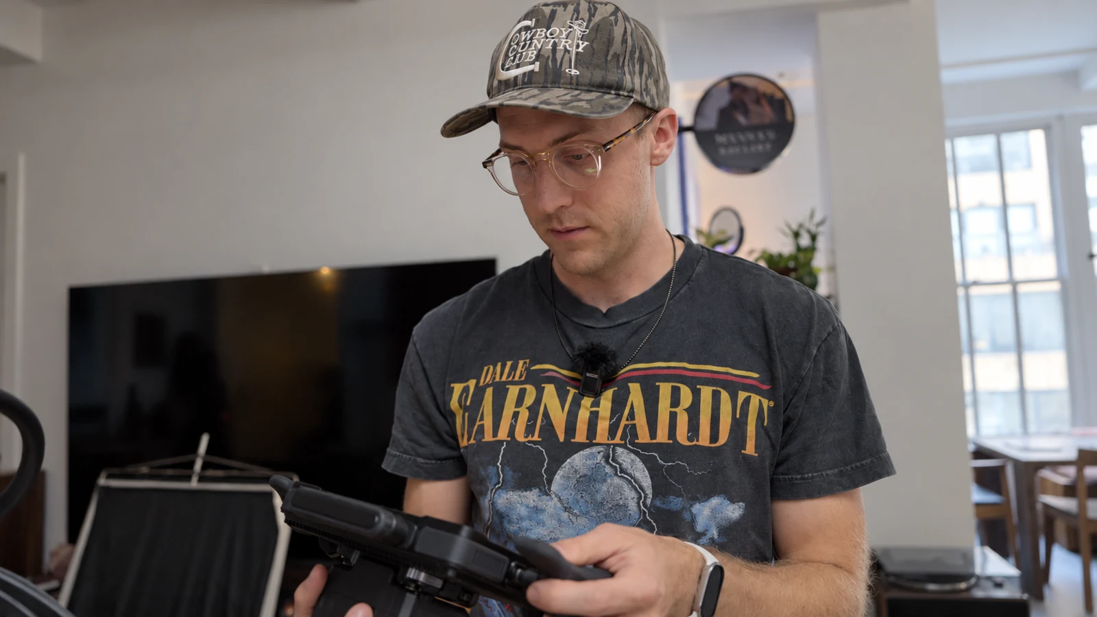 Jordan working with a monitor on set